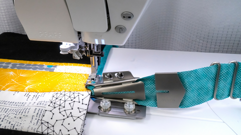 Immagine di copertina: Pfaff Quilt Binder: come funziona il piedino bordatore