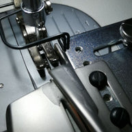 Piedino bordatore 32mm. per macchine industriali